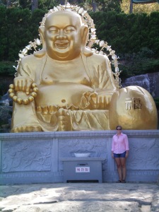Beside the giant golden Buddha at Haedong Yonggungsa Temple